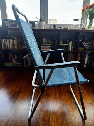Silla plegable con reposabrazos