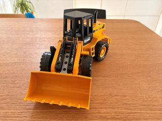 Escavatore da costruzione giallo marca bruder