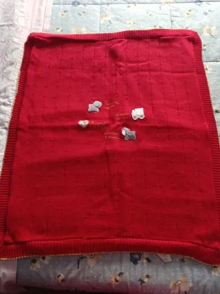 Copertina rossa per carrozzina