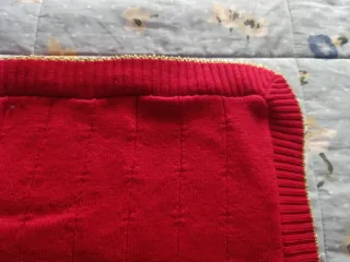 Copertina rossa per carrozzina