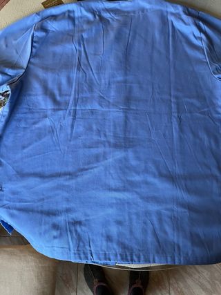 Blusa uniforme azul manga corta abierta con botone