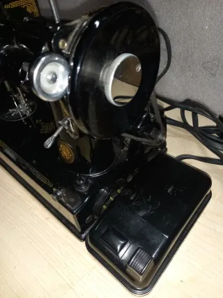 Macchina da cucire Singer con accessori