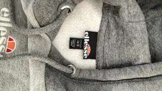 Sudadera Ellesse Gris y pantalón Joma