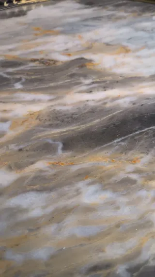 Mesa auxiliar vintage mármol y metal