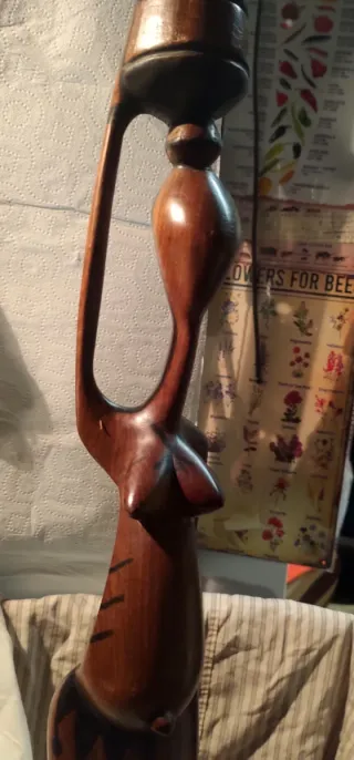 Scultura africana  donna incinta con vaso massello