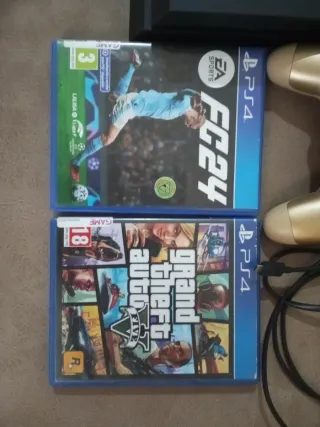 PS4 (PlayStation 4) con 2 mandos y juegos