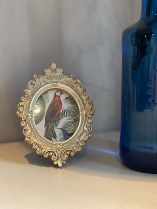 Piccola cornice dorata in resina