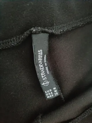 Pantalón campana Stradivarius negro