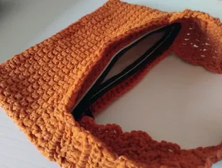Bolso de mano tejido artesanal naranja