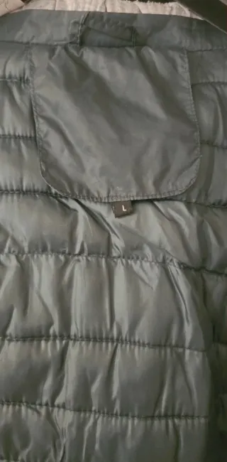 Piumino con cappuccio grigio