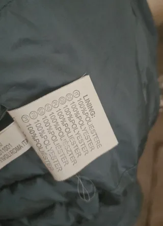 Piumino con cappuccio grigio