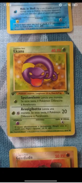 Carta Pokémon Ekans Fossil 1a Edizione