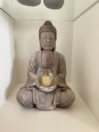 Figura Buda Piedra con Portavelas Cristal