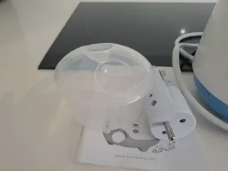 Calienta biberones SATO con accesorios