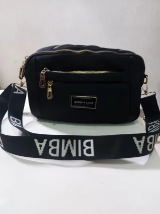 Borse, cinture e portafogli di marca