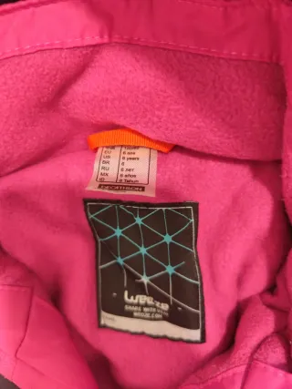 Buzo Nieve Niña Rosa y morado. En perfecto estado.