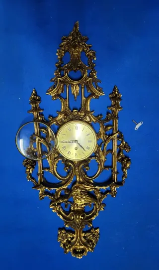 Orologio da parete dorato anni '60