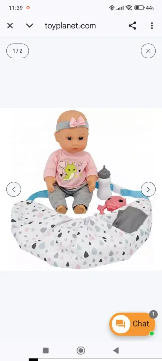 Muñeca bebé con capazo transportín