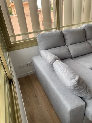 Sofá chaiselongue gris tela