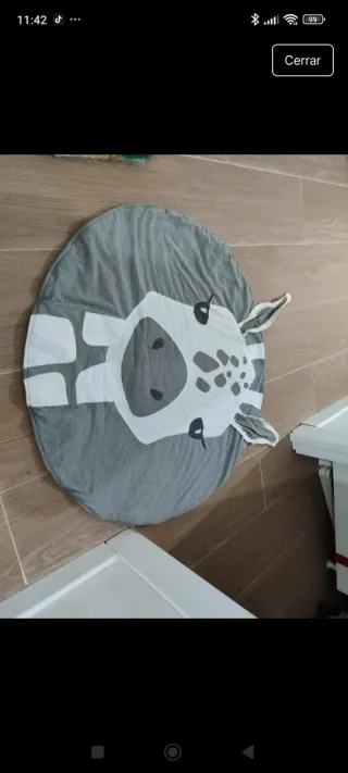 Alfombra infantil jirafa tela