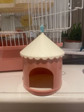 Jaula para hámster rosa y blanca