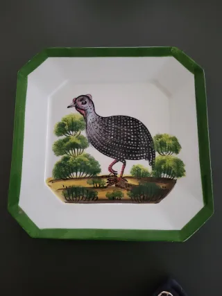 Piatto decorativo in ceramica con uccello