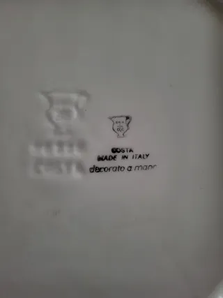 Piatto decorativo in ceramica con uccello