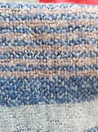 Bufanda tejida con flecos