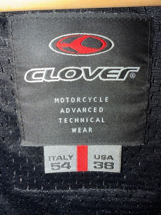 Mono de moto Clover negro y blanco