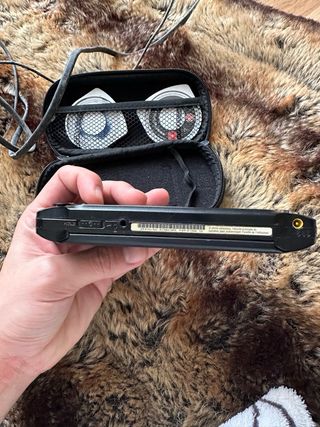 PSP Sony Negra + 2 Juegos