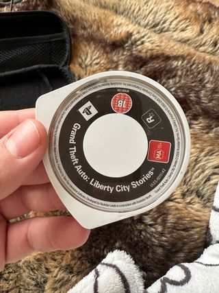 PSP Sony Negra + 2 Juegos