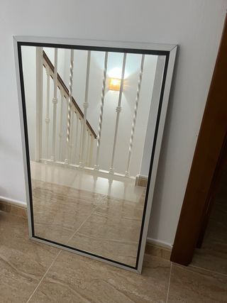 Espejo de pared plateado y marrón