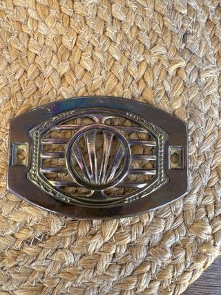 Antigua mirilla de laton