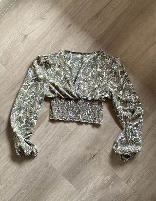 Blusa estampada manga larga