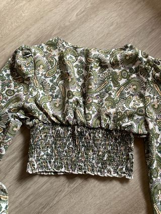 Blusa estampada manga larga