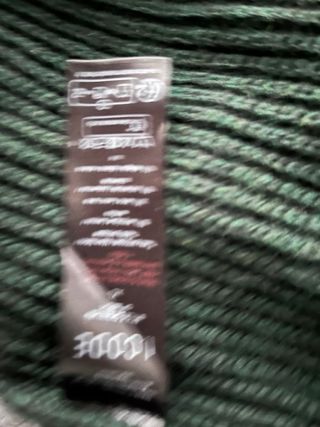 Jersey de punto verde con detalles