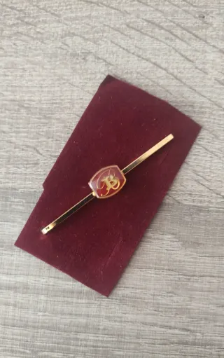 Sujetacorbata dorado con inicial B