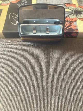 Cenicero antiguo con imán