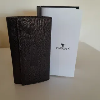 Billetera Farrutx Negra , muy completa, varios dep