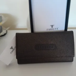 Billetera Farrutx Negra , muy completa, varios dep