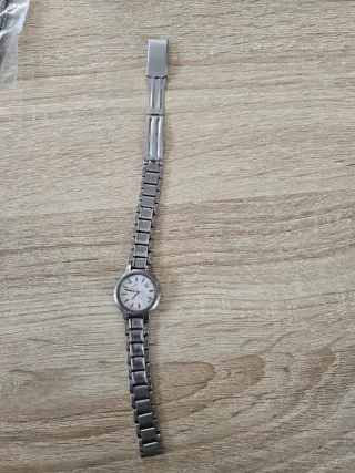 Reloj Seiko Titanium Oro y Plata