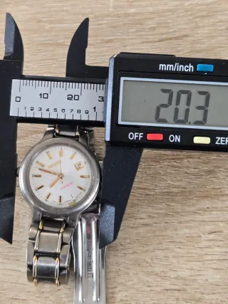 Reloj Seiko Titanium Oro y Plata