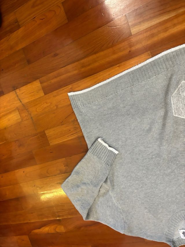 Felpa grigia con dollaro bianco