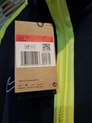 Chaqueta Nike transpirable azul y amarilla