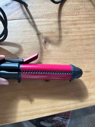 Plancha de pelo Rowenta casi nueva, multiusos.