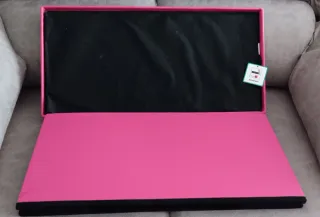 Puff baúl rosa polipiel