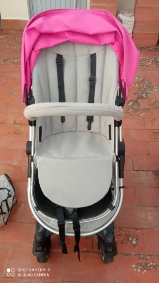 Saco/silla de bebé rosa y gris
