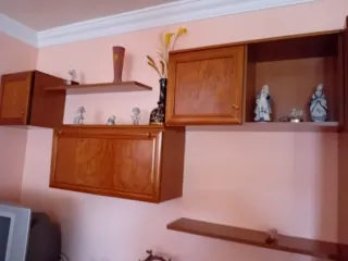 Mueble de salón madera y cristal