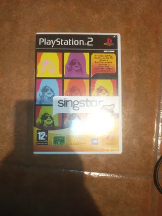 Juegos PS2 Singstar + Micrófonos y Adaptador
