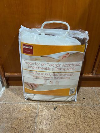 Ropa de cuna: sábanas, edredón y cubrecolchón.